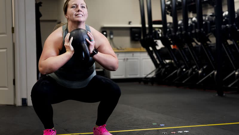 Jody Reid participates in a fitness class at Roy CrossFit in Roy on Wednesday, Nov. 9, 2022. One of the best solutions — both to prevent osteoporosis from developing and to regrow bone once the condition is present — is to lift weights.