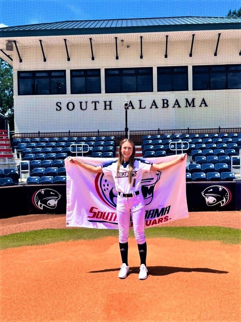 Jay infielder Caitlyn Gavin stands on the infield at Jaguar Field after announcing her commitment to play softball for the University of South Alabama on Monday, July 18, 2022.