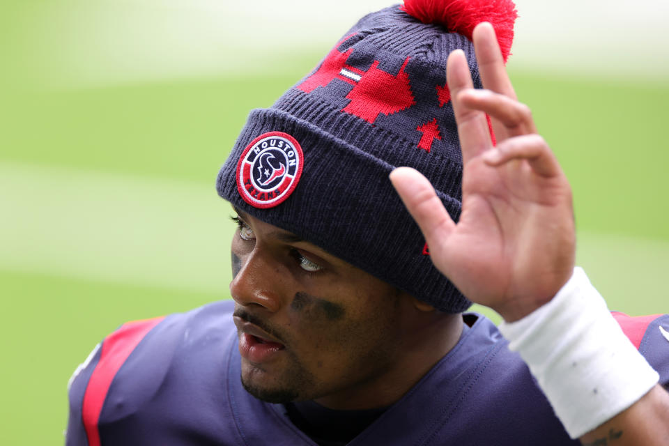 HOUSTON, TEXAS - DECEMBER 27: Quarterback Deshaun Watson #4 of the Houston Texans walks off the field after a 37-31 loss to the Cincinnati Bengals at NRG Stadium on December 27, 2020 in Houston, Texas. (Photo by Carmen Mandato/Getty Images)