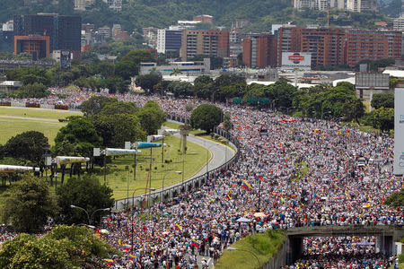 Opposition supporters take part in a rally against Venezuela's President Nicolas Maduro's government in Caracas, Venezuela, October 26, 2016. REUTERS/Christian Veron