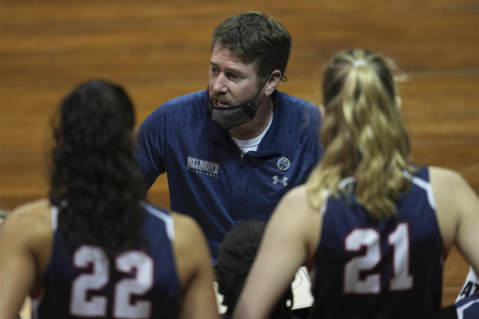 Belmont head coach Bart Brooks talks to his team during the first half of a college basketball game against Gonzaga in the first round of the women's NCAA tournament at the University Events Center in San Marcos, Texas, Monday, March 22, 2021. (AP Photo/Chuck Burton)