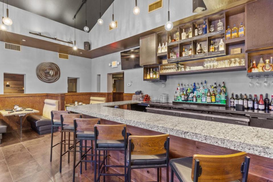 Tallahassee's Melting Pot redesign features a more open, inviting floor plan with an open dining room and designated, but easily visible bar area.
