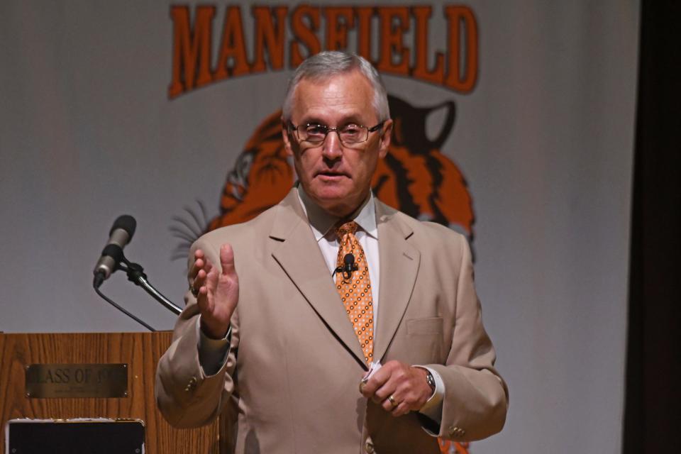 Former Ohio State football coach and current Youngstown State president Jim Tressel speaks to the Mansfield City Schools employees in 2019.