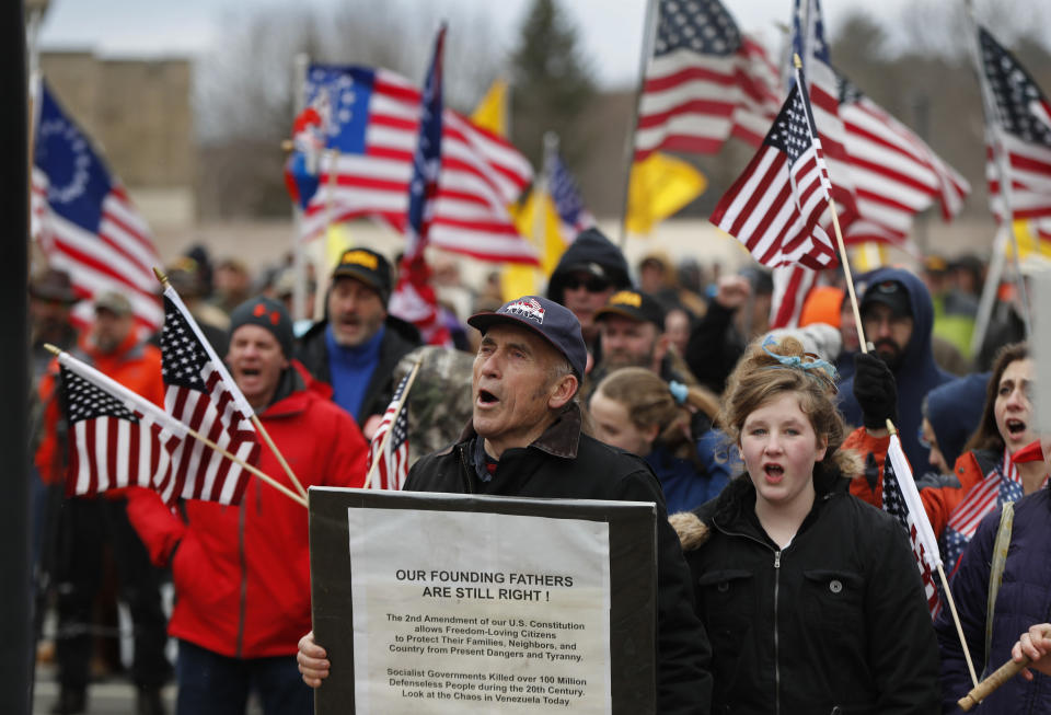 <p>Maine gun rights supporters cheer at a rally, Saturday, April 14, 2018, at the State House in Augusta, Maine. (Photo: Robert F. Bukaty/AP) </p>