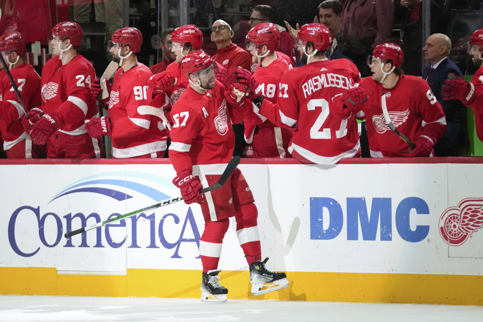 Detroit Red Wings left wing David Perron (57) celebrates his goal against the Dallas Stars in the first period of an NHL hockey game Tuesday, Jan. 23, 2024, in Detroit. (AP Photo/Paul Sancya)