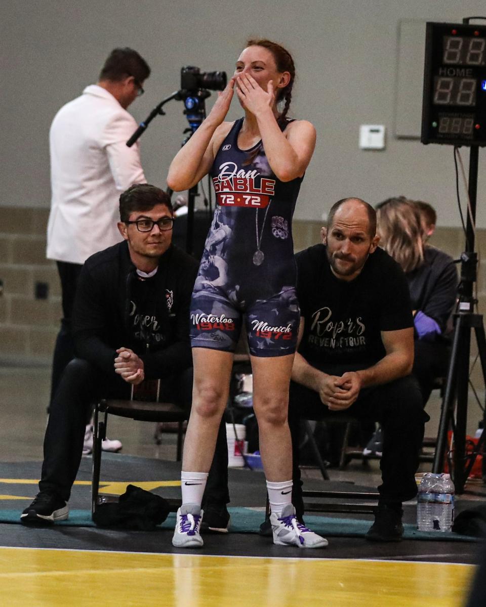 Becca Roper blows kisses to her fans before her match at the StaleMates II competition Oct. 29, 2021, at the Elwell Family Food Center at the Iowa State Fairgrounds, Des Moines.