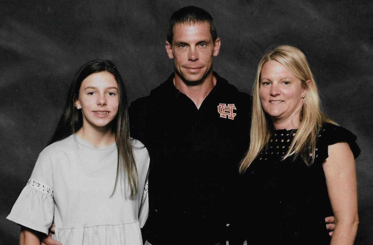 New Brevard High head football coach Luke Coleman poses with his wife, Tenille, and their daughter, Rylie.