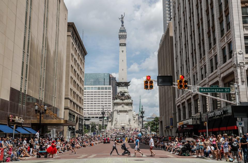 Indy 500 race fans line the streets of downtown Indianapolis for the annual IPL 500 Festival Parade, on Saturday, May 25, 2019. 