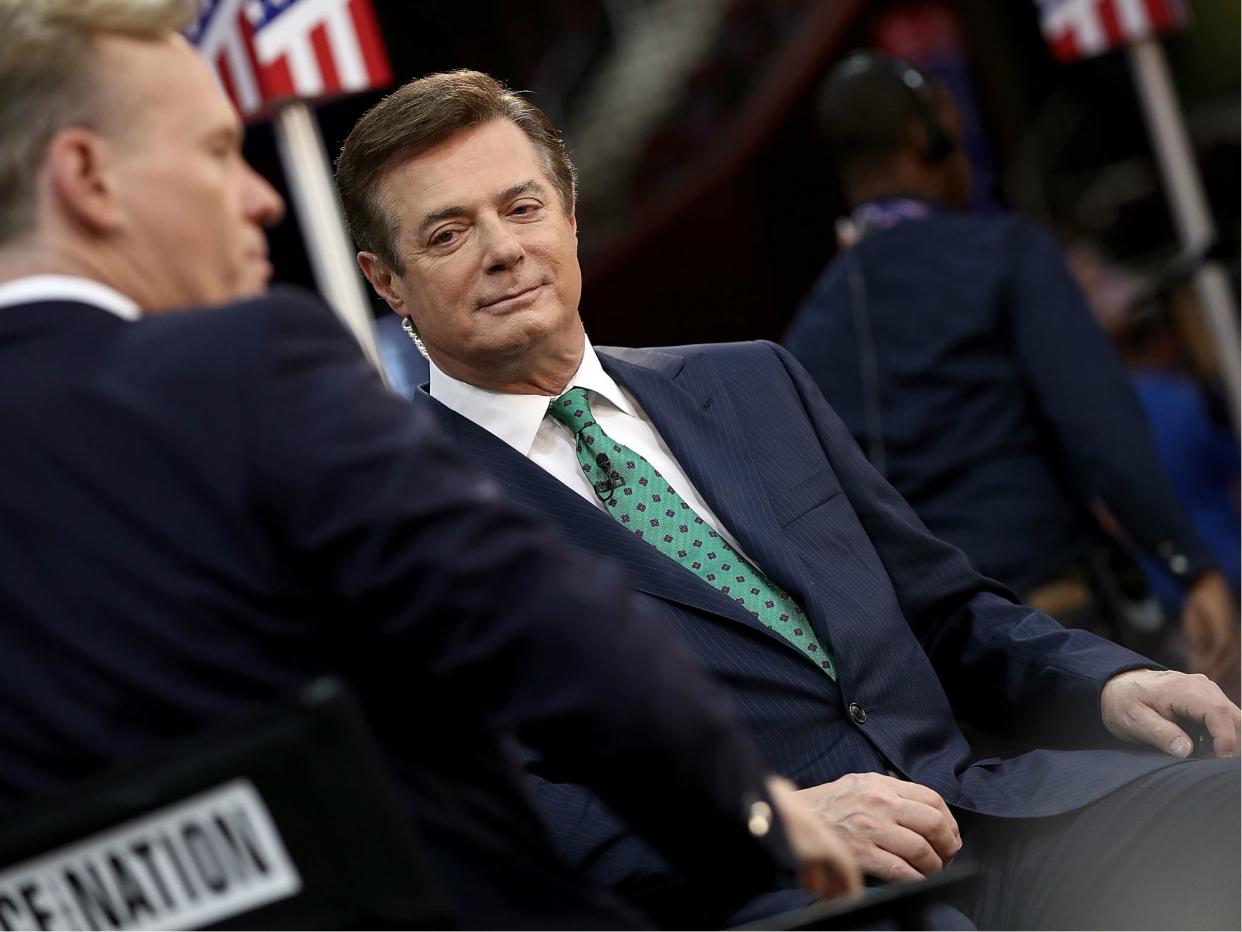 Paul Manafort, former campaign manager for President Donald Trump, is interviewed on the floor of the Republican National Convention 17 July 2016: Win McNamee/Getty Images