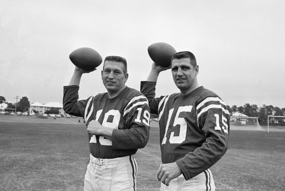 Quarterbacks Johnny Unitas, left, and Earl Morrall.