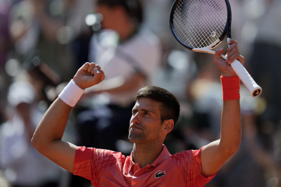 Serbia's Novak Djokovic celebrates after beating Peru's Juan Pablo Varillas in their fourth round match of the French Open tennis tournament at the Roland Garros stadium in Paris, Sunday, June 4, 2023. (AP Photo/Thibault Camus)