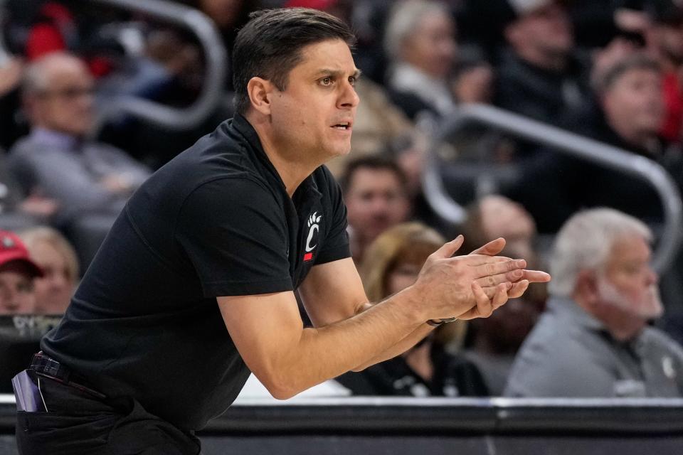 Cincinnati Bearcats head coach Wes Miller watches from the sideline in the second half of the NCAA basketball game between the Merrimack Warriors and the Cincinnati Bearcats at Fifth Third Arena in Cincinnati on Tuesday, Dec. 19, 2023. The Bearcats won 65-49.