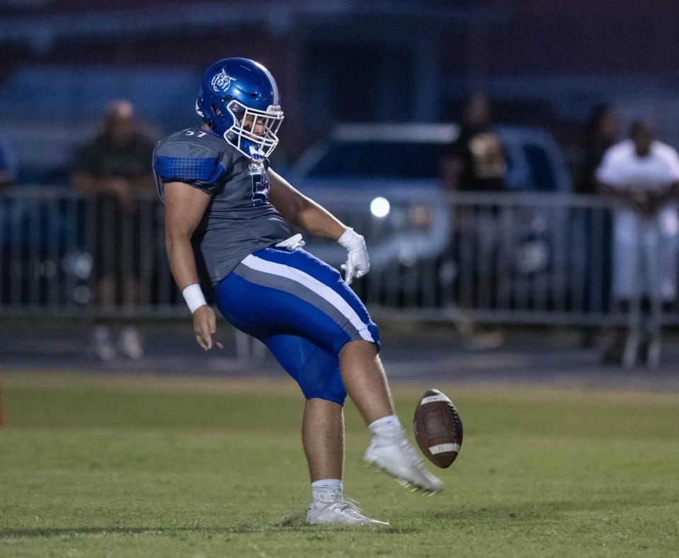 The Wildcats punt the ball during the West Florida vs Washington football game at Booker T. Washington High School in Pensacola on Friday, Sept. 2, 2022.