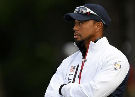 Team USA vice-captain Tiger Woods talk at the 13th green during the practice round for the Ryder Cup at Hazeltine National Golf Club in Chaska, Minnesota, September 28, 2016. Mandatory Credit: Michael Madrid-USA TODAY Sports/File photo