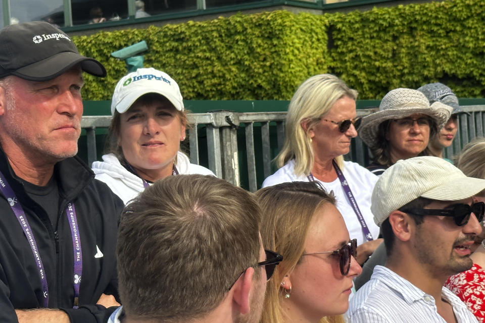 Lynn Nabors McNally, second left, the mother and coach of Caty McNally, watches as her daughter and Ashlyn Krueger of the United States play against Caroline Garcia of France and Luisa Stefani of Brazil in a first-round women's doubles match at Wimbledon on July 8, 2023. Nabors McNally was one of six female coaches working with a player in the women's singles competition at Wimbledon. There are only 13 women in the WTA Top 200 with a female coach, and four of them are the player's mother. (AP Photo/Howard Fendrich)