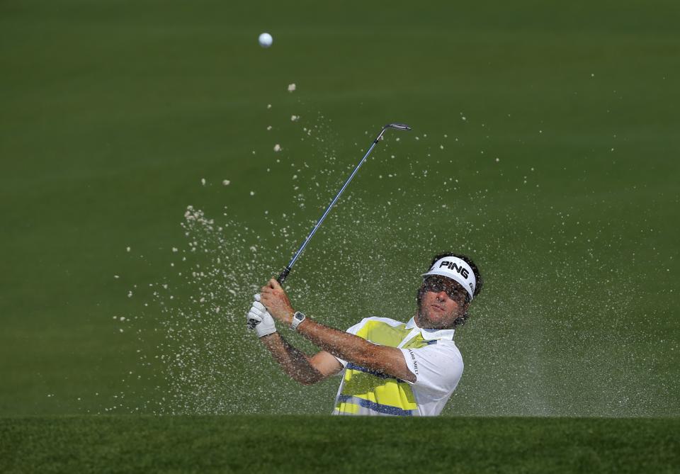 U.S. golfer Bubba Watson hits from the sand trap on the second hole during the second round of the Masters golf tournament at the Augusta National Golf Club in Augusta, Georgia April 11, 2014. REUTERS/Brian Snyder (UNITED STATES - Tags: SPORT GOLF)