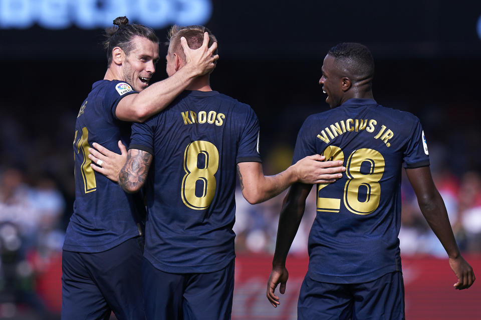 VIGO, SPAIN - AUGUST 17: Toni Kroos of Real Madrid CF celebrates after scoring the second goal of his team with his team mates during the Liga match between RC Celta de Vigo and Real Madrid CF at Abanca-Balaídos on August 17, 2019 in Vigo, Spain. (Photo by Quality Sport Images/Getty Images)