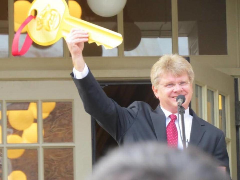 York County Clerk of Court David Hamilton holds up the key to the newly renovated courthouse during a grand opening celebration Sunday.