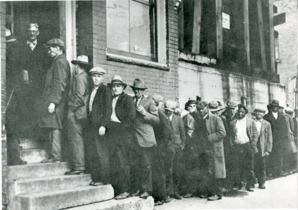Unemployed Akron men did a lot of standing and waiting in 1932 during the depths of the Great Depression.