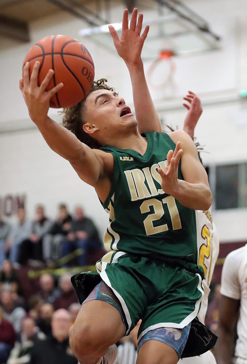STVM guard Jayson Walker attempts a layup during the first half of a basketball game, Tuesday, Dec. 13, 2022, in Cuyahoga Falls, Ohio.