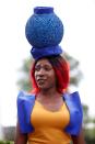 <p>A racegoer during Ladies Day at the Royal Ascot horse races in Ascot, Britain on June 22, 2017. (Toby Melville/Reuters) </p>