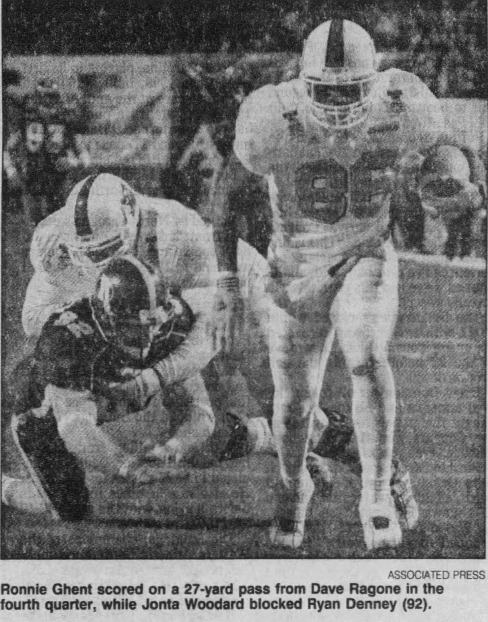 Louisville receiver Ronnie Ghent scores on a 27-yard pass from Dave Ragone during the Liberty Bowl on Dec. 31, 2001 in Memphis, Ten..