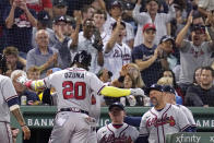 Atlanta Braves' Marcell Ozuna dances while celebrating at the dugout after his three-run home run off Boston Red Sox starting pitcher Nick Pivetta during the fourth inning of a baseball game Wednesday, Aug. 10, 2022, in Boston. (AP Photo/Charles Krupa)