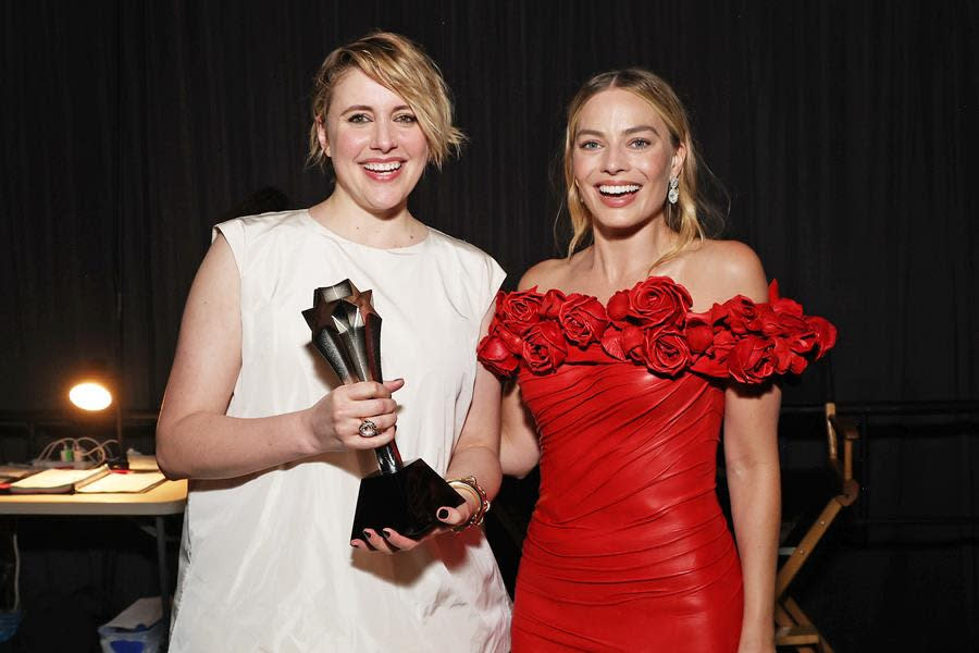 (Left to Right) Greta Gerwig and Margot Robbie are all smiles as the winners of the Best Comedy Award for “Barbie” at the 29th Annual Critics Choice Awards at Barker Hangar in Santa Monica. (Kevin Mazur/Getty Images for Critics Choice Association)