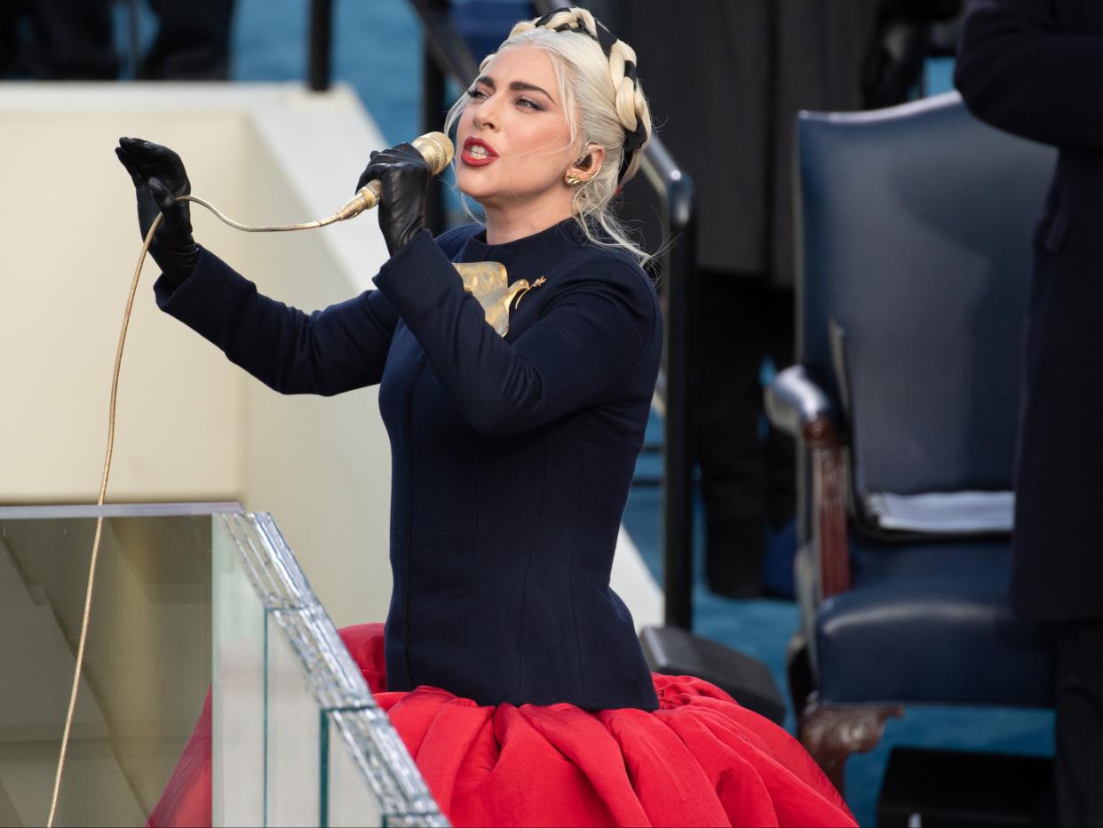 Lady Gaga sings at President Joe Biden’s inauguration on 20 January 2021 in Washington, DC (SAUL LOEB/POOL/AFP via Getty Images)