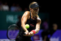 Tennis - WTA Tour Finals - Singapore Indoor Stadium, Kallang, Singapore - October 22, 2018 Germany's Angelique Kerber in action during her group stage match against Kiki Bertens of the Netherlands REUTERS/Edgar Su