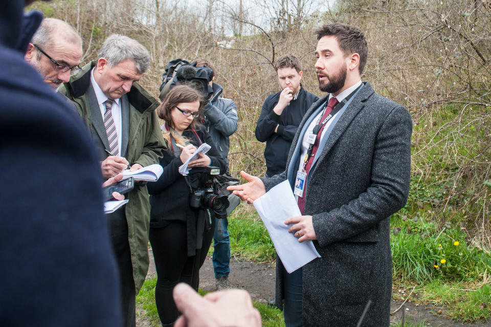 Detective Chief Inspector Lewis Hughes, right, addresses the media (Picture: Caters)