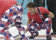 Norway's skip Thomas Ulsrud shouts to teammates during their men's curling round robin game against Switzerland in the Ice Cube Curling Centre at the Sochi 2014 Winter Olympic Games February 16, 2014. REUTERS/Ints Kalnins (RUSSIA - Tags: SPORT OLYMPICS SPORT CURLING)