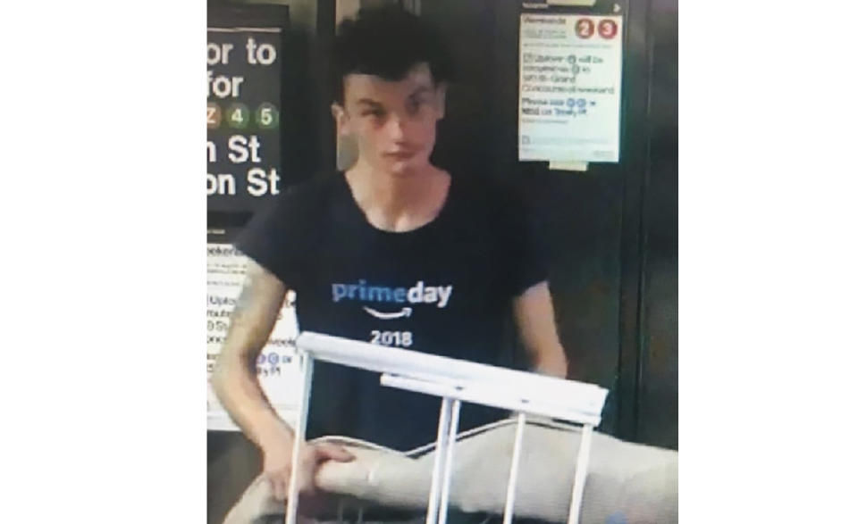 This photo released by NYPD shows a person of interest wanted for questioning in regard to the suspicious items placed inside the Fulton Street subway station in Lower Manhattan on Friday, Aug. 16, 2019 in New York. Three abandoned devices that looked like pressure cookers prompted an evacuation of the major downtown subway station and closed off an intersection in the Chelsea neighborhood before police determined the objects were not explosives. Police were looking to talk to a man seen on surveillance video taking two of the rice cookers out of a shopping cart and placing them in the subway station in lower Manhattan. (NYPD via AP)