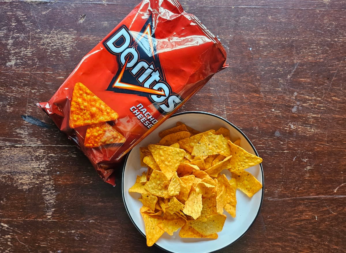 doritos nacho cheese in a bag and a bowl.