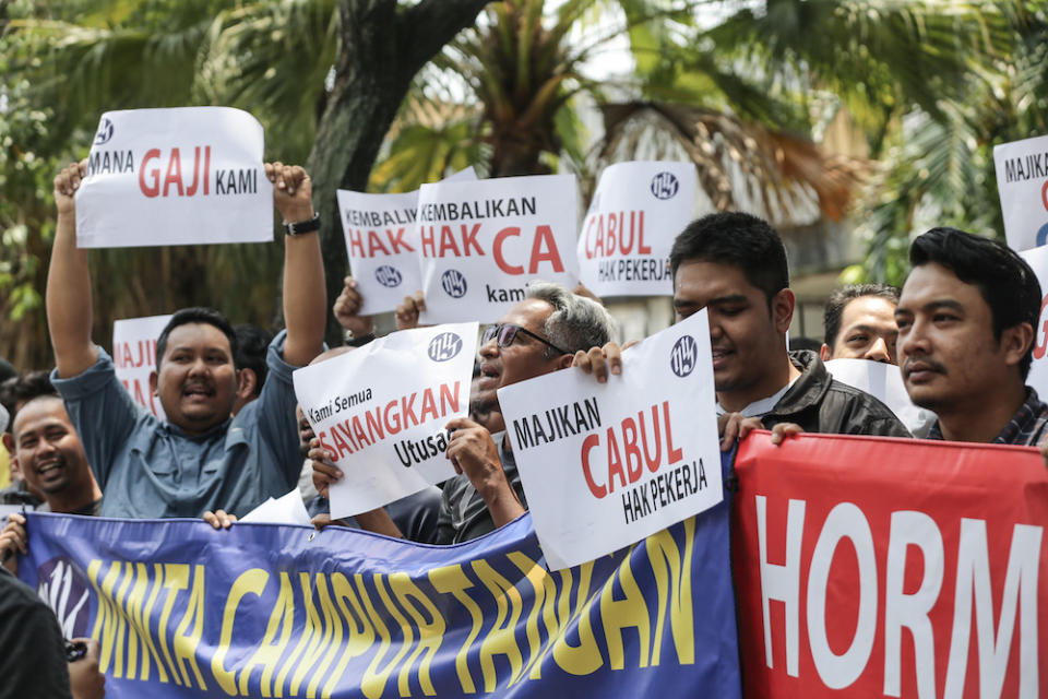 Utusan Malaysia workers protest over unpaid salaries in front of Utusan headquarters in Kuala Lumpur August 19, 2019. — Picture by Ahmad Zamzahuri