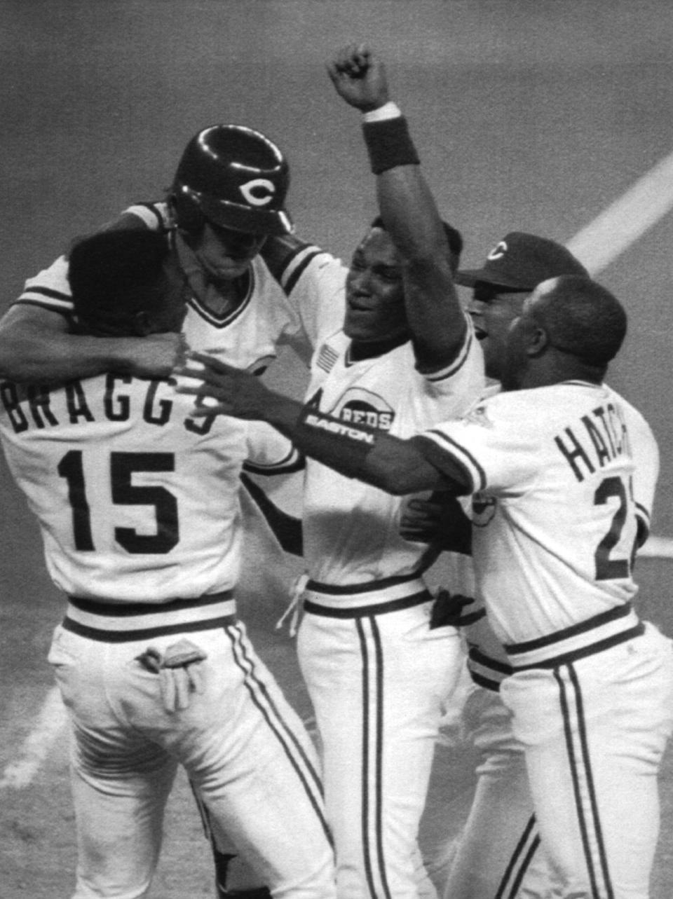 OCTOBER 18, 1990: Cincinnati's Glenn Braggs, left, Billy Bates (helmet) who scored the winning run, Eric Davis, Jose Rijo and Billy Hatcher, right, celebrate after the Reds best the Oakland Athletics 5-4 to go up 2-0 in the best-of-seven series.