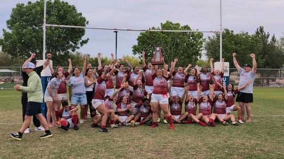 The Sacramento Amazons women’s rugby team celebrates advancing to the national championships. Captain Leka Green holds up the trophy after the Amazons beat Las Vegas Rugby 60-7 in the Pacific Super Regional ahead of Saturday’s game at the USA Club Rugby Championships.