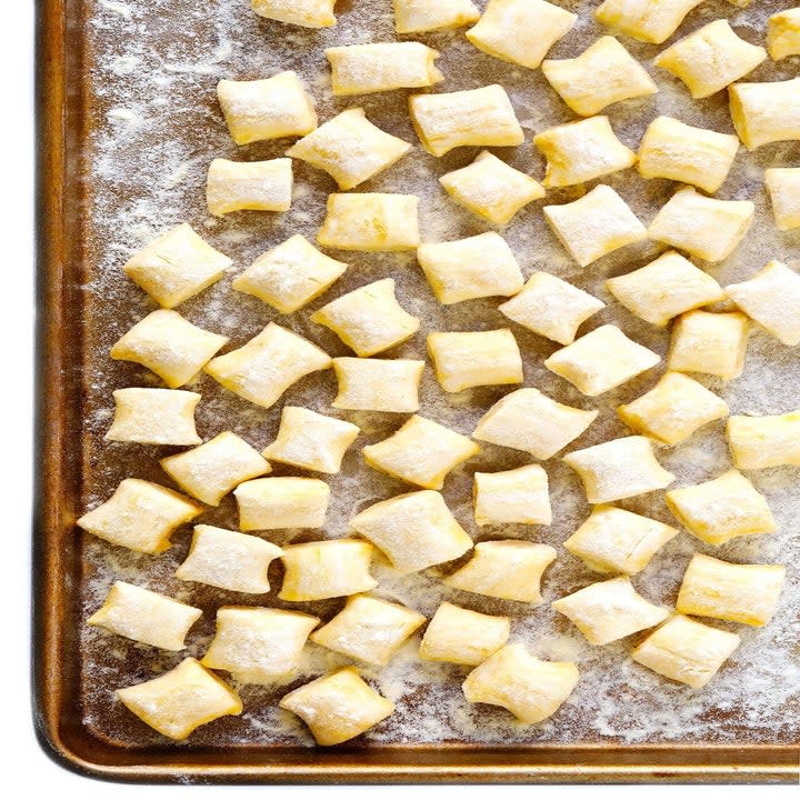 fresh gnocchi on a floured tray