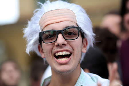 A supporter of Bernie Sanders wears a wig in San Juan, Puerto Rico. REUTERS/Alvin Baez