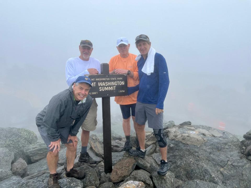 From left, Mike Elia, Steve Morelli, Dave Buckley and Peter Sanchioni pose at the summit of Mt. Washington on July 22.