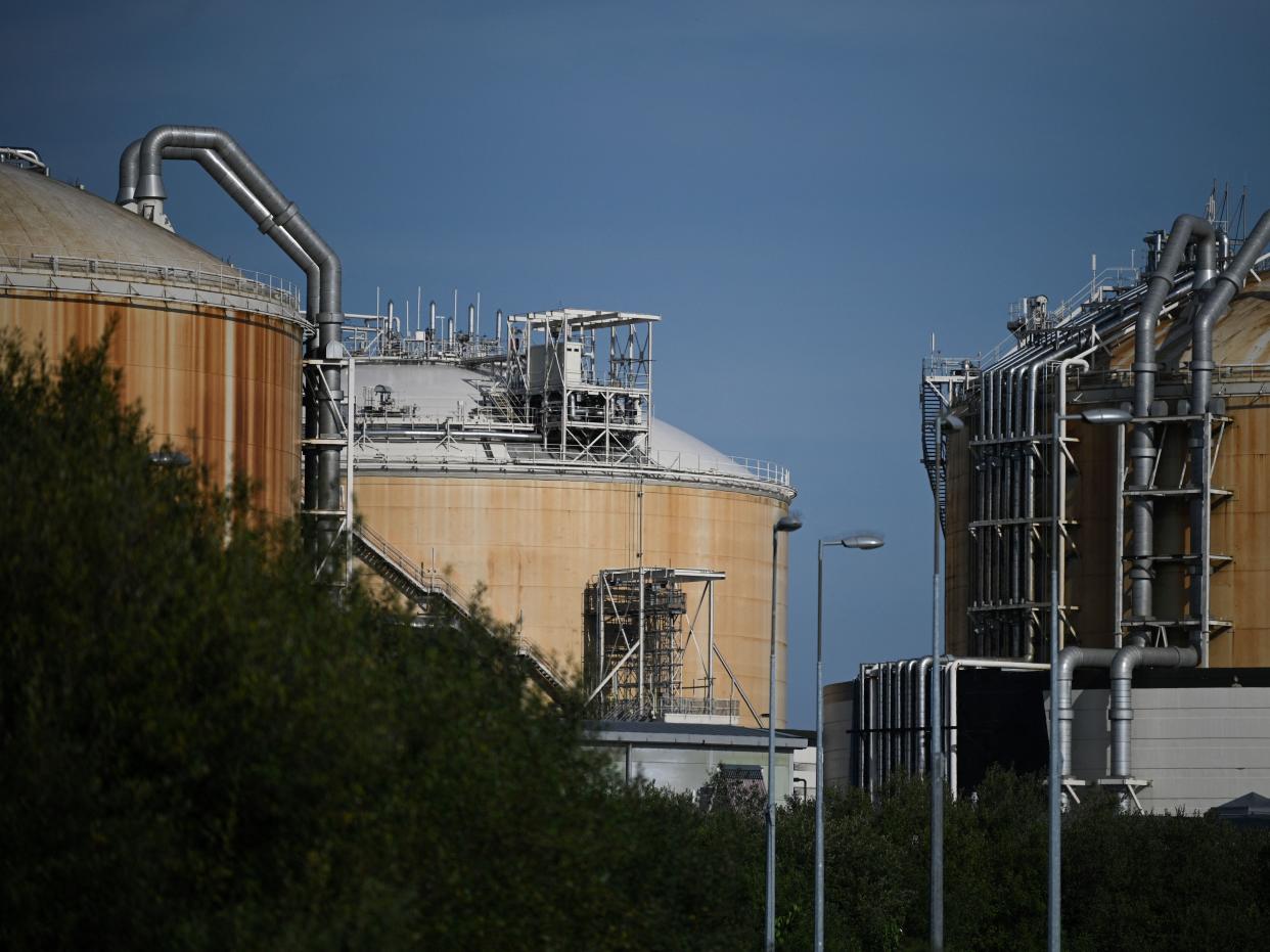 Liquefied Natural Gas (LNG) storage tanks are seen at the Grain LNG import terminal near Grain, Isle of Grain, southeast England on September 21, 2021