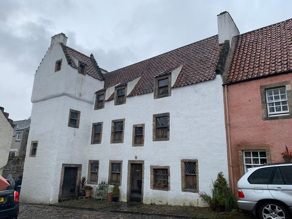 A historical home on a street in Culross, Scotland.