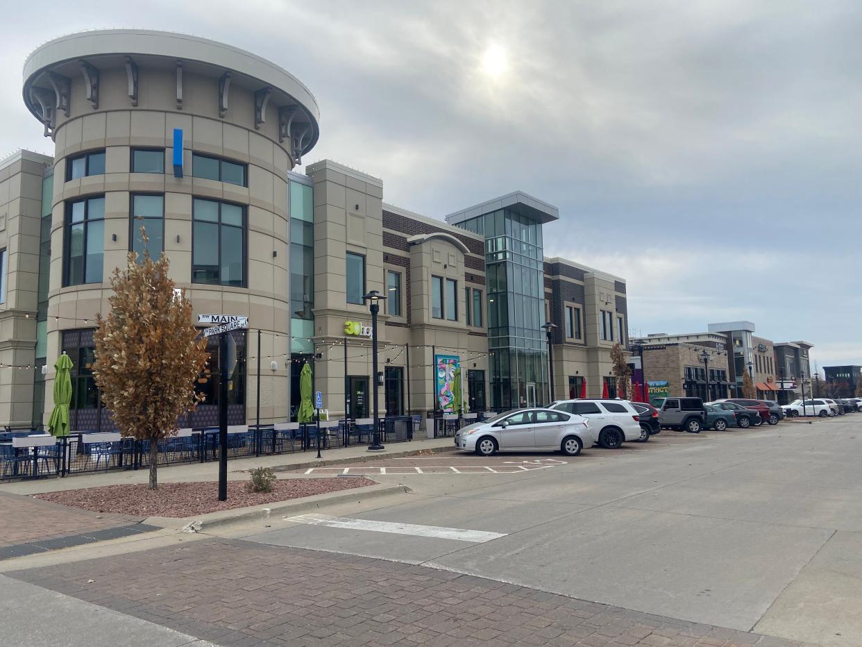 Stores and restaurants on southwest Main Street at the District at Prairie Trail in Ankeny include 30Hop and Wasabi.