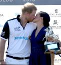 <p>The couple shared a smooch at the polo following <a href="https://www.elle.com/uk/fashion/celebrity-style/a22559039/meghan-markle-carolina-herrera-navy-blue-dress-polo/" rel="nofollow noopener" target="_blank" data-ylk="slk:Prince Harry's triumphant return to the pitch" class="link ">Prince Harry's triumphant return to the pitch</a> and, we're in love, July 2018. </p>