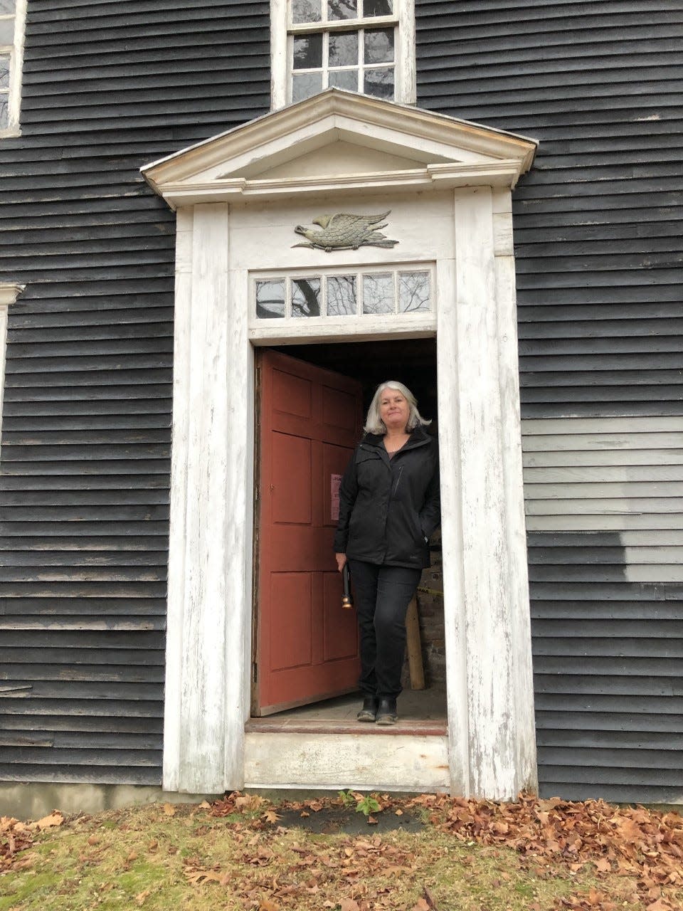 Kari Gates at the entrance to the Barnard Tavern, which faces Route 1 in Kennebunk, Maine. Gates and her husband, Randy, are hoping to convert the structure into an inn.