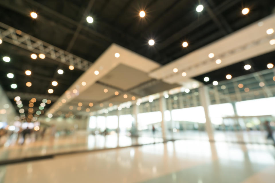 A public exhibition hall with contemporary lighting fixtures.