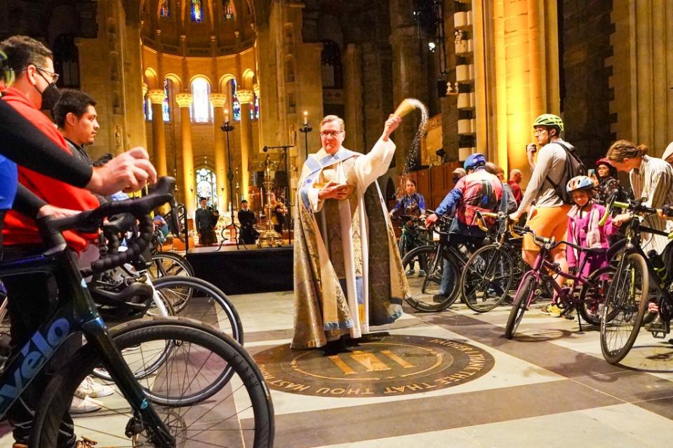 Rev. Patrick Malloy said people come from all over the world for the annual Blessing of the Bicycles event at the Cathedral of St. John the Divine. Robert Miller