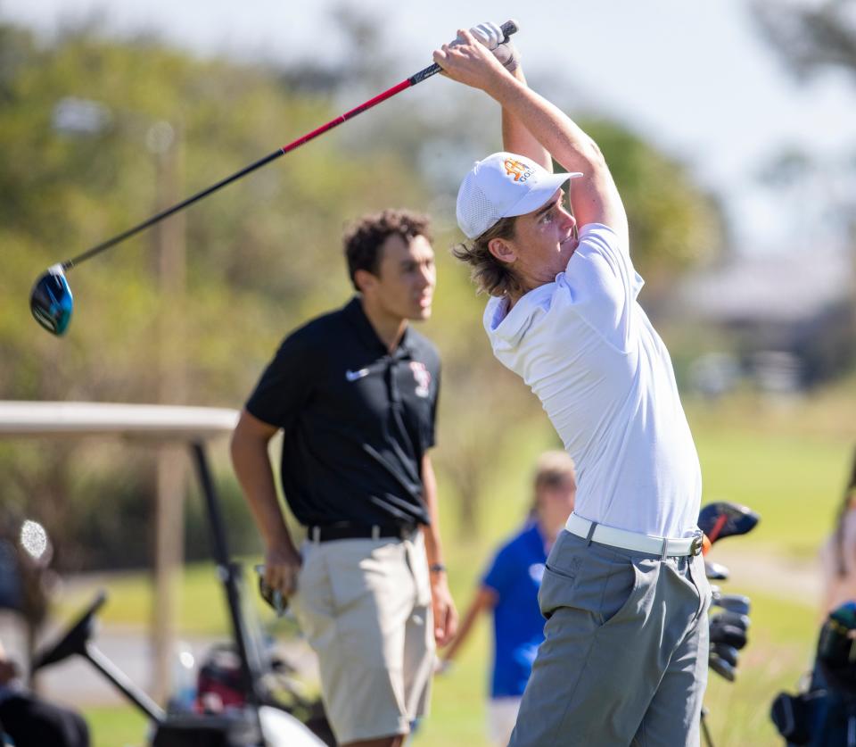 Mosley golfer Hunter Dye tees off on the eighth hole. High school golfers competed in District golf competition at the Panama Country Club Monday, October 25, 2021.