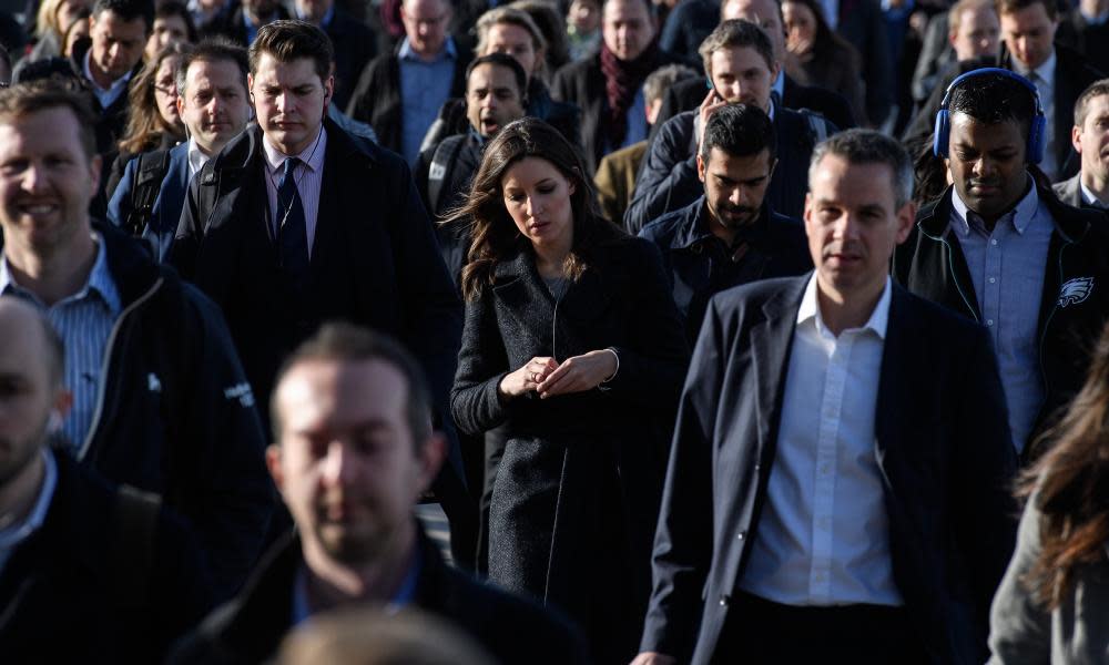 Commuters cross London Bridge