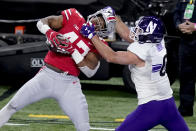 Ohio State linebacker Justin Hilliard, left, intercepts a pass intended for Northwestern tight end John Raine a during the second half of the Big Ten championship NCAA college football game, Saturday, Dec. 19, 2020, in Indianapolis. (AP Photo/Darron Cummings)